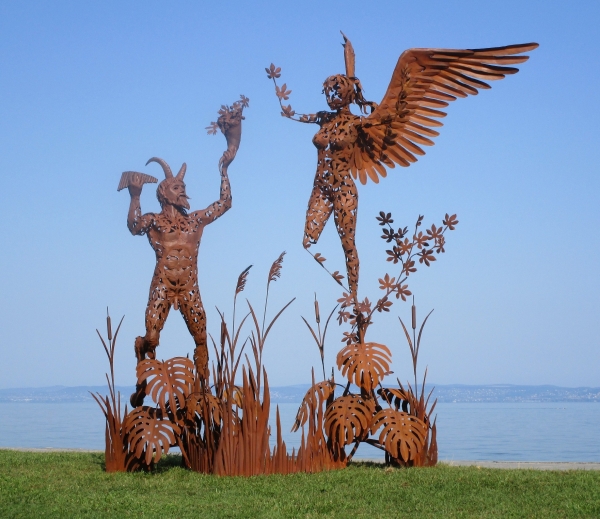 Syrinx und Pan Statuetten rusty iron